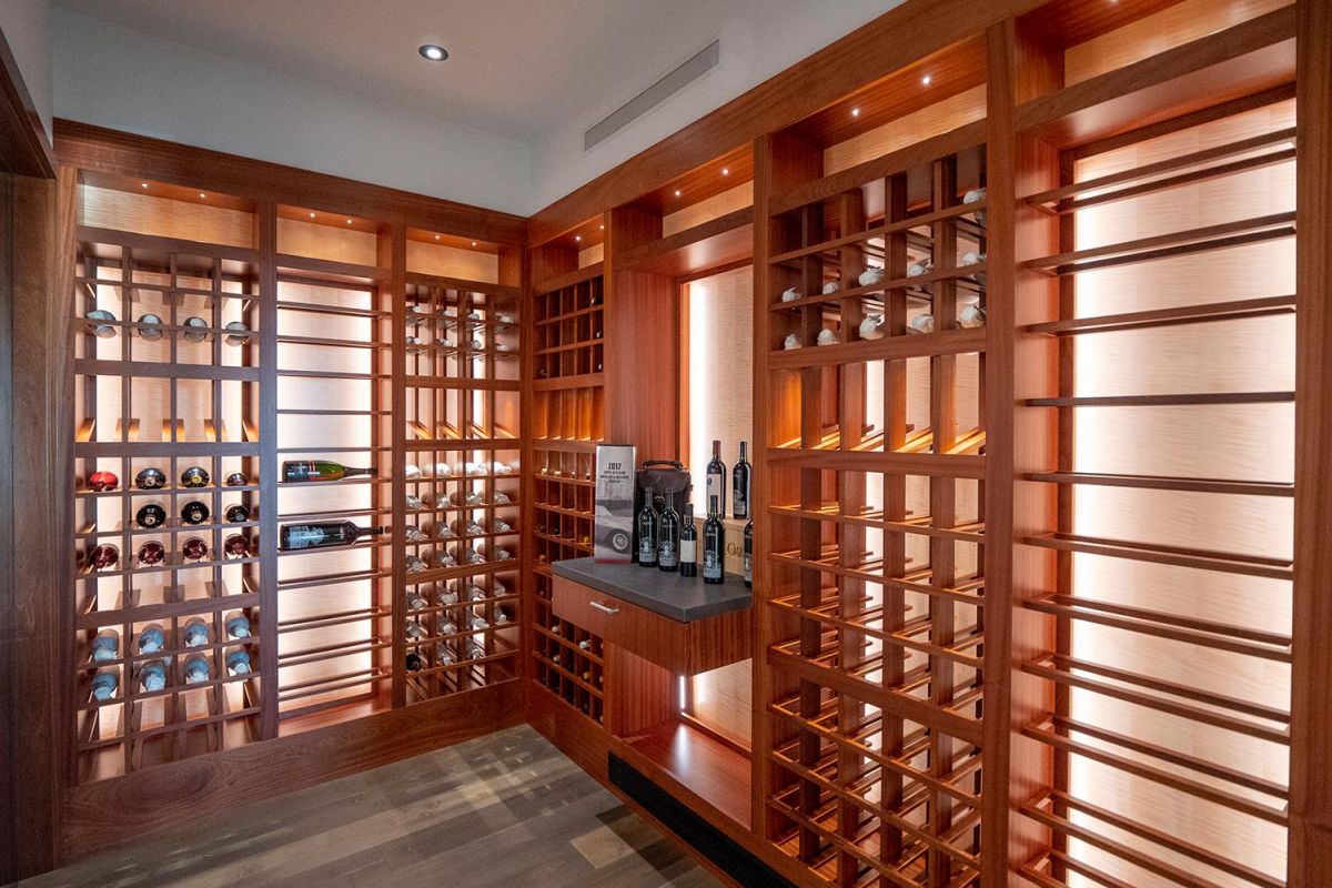 Elegant wooden wine cellar with illuminated bottle racks