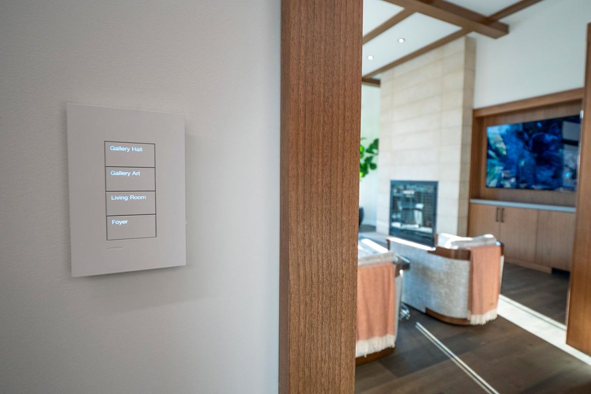 Light switch panel labeled for different areas of the home